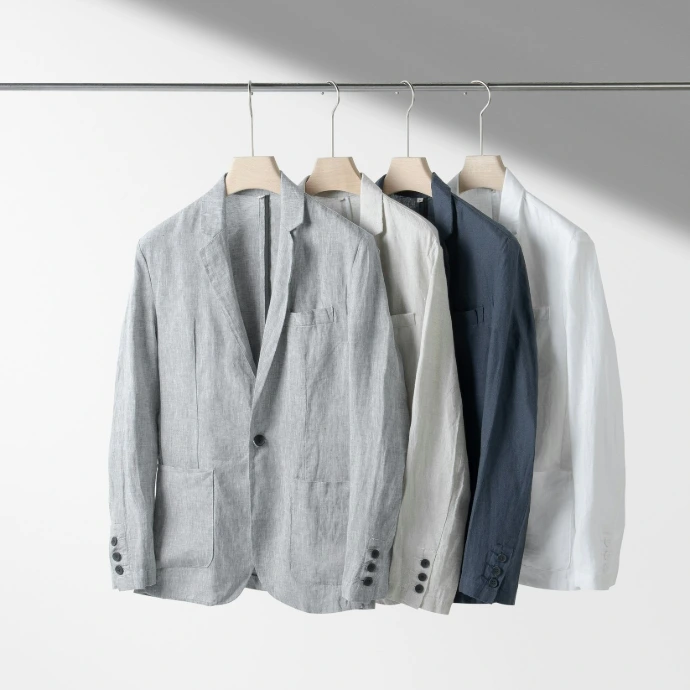 A row of shirts hanging on a clothes line
